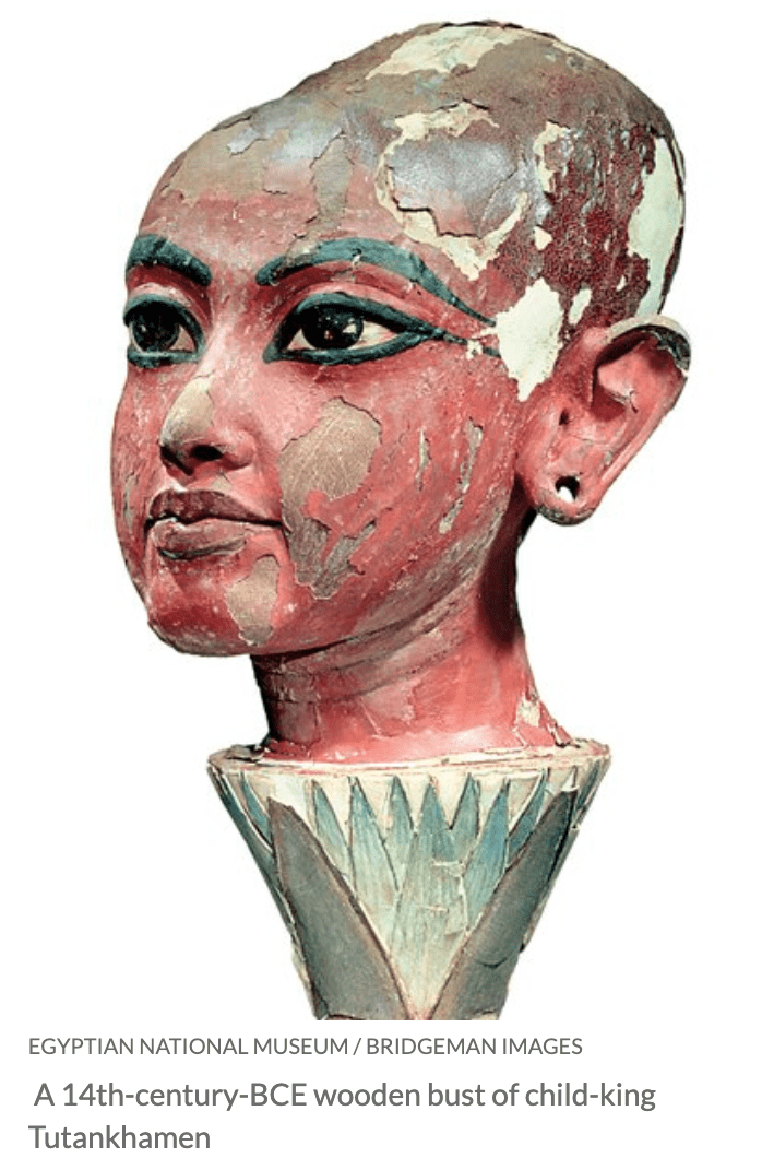 14th-century BCE wooden bust of the child-king Titankhamen, his eyes thickly lined in black kohl